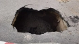 Жители Парголово заметили двухметровую яму в асфальте ...