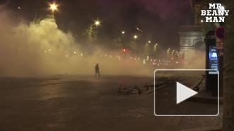 Полиция применила слезоточивый газ на Елисейских полях против болельщиков