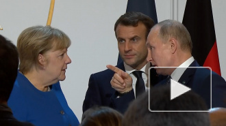 Меркель назвала Путина "победителем" на саммите в Париже