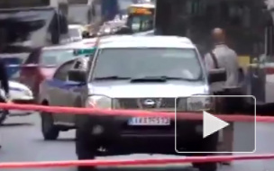 Видео с места взрыва в Афинах: Совершено покушение на бывшего премьер - министра Греции