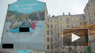 Петербуржцев возмутило граффити с рекламой сотового оператора на историческом здании