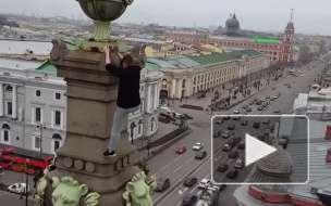 Появилось видео вылазки руфера на крышу Елисеевского магазина