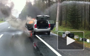 В Петербурге водитель на бетономешалке спас горящий джип