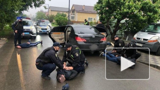 Видео: В пригороде Киева десятки человек в балаклавах устроили перестрелку