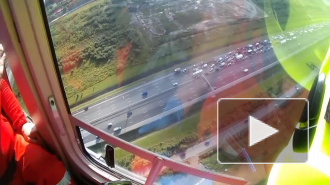 Огромную пробку КАД из-за ДТП с автобусом сняли на видео с вертолета