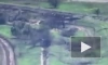 Беспилотник снял на видео капитуляцию военных, поднявших белые флаги