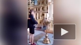 В Чите проверяют видео, где подросток прикурил от свечи в церкви