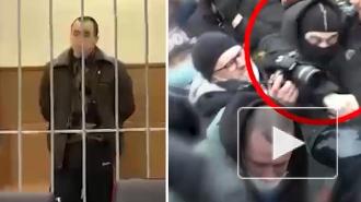 Суд арестовал молодого человека, избившего полицейского на незаконной акции в Москве