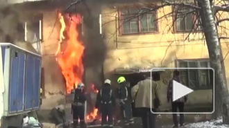 Сотрудники ДПС ГИБДД спасли людей из горящего дома в Подмосковье