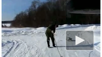 Русская народная забава - буксиром на валенках
