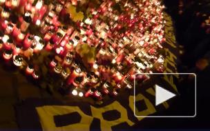 Жители Вены приходят почтить память жертв теракта