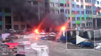 Появилось видео с Октябрьской набережной, где горит жилой комплекс
