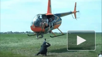 СК заинтересовало видео про вертолет с приклеенным к нему на скотч мужчиной