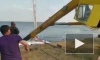 Падение крана с лодкой в Кронштадте попало на видео