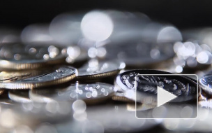 Курс рубля снизился вслед за нефтью