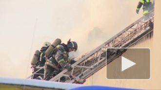 Пожарные эвакуировали из горящего дома 15 человек, в том числе двух детей в возрасте 8 и 15 лет