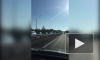На Мурманском шоссе автомобили стоят в огромной пробке из-за аварийного "паровозика"