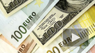 Курсы евро и доллара на Московской валютной бирже немного выросли 